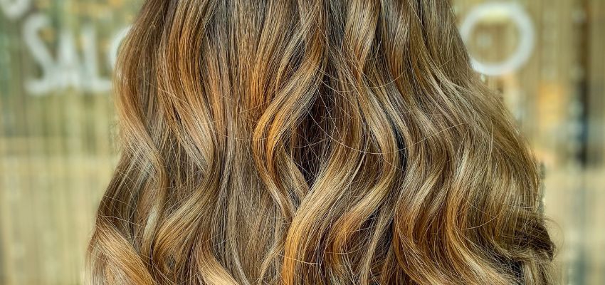 xr:d:DAGCEvhukPQ:5,j:4112210950225188180,t:24041102 Bronde hair color is an exquisite blend of brown and blonde hues. It perfectly balances light and dark shades for a stunning, sun-kissed effect.