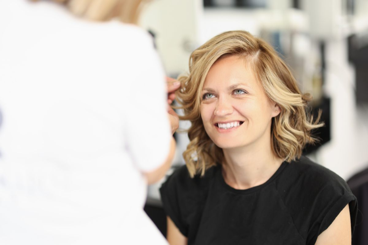 xr:d:DAGCEjzVcYM:3,j:1832263638961617739,t:24041102 The woman is excited to have bronde hair.