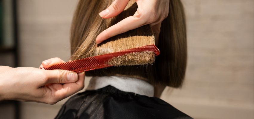 The woman wants to trim her Italian bob hairstyle.