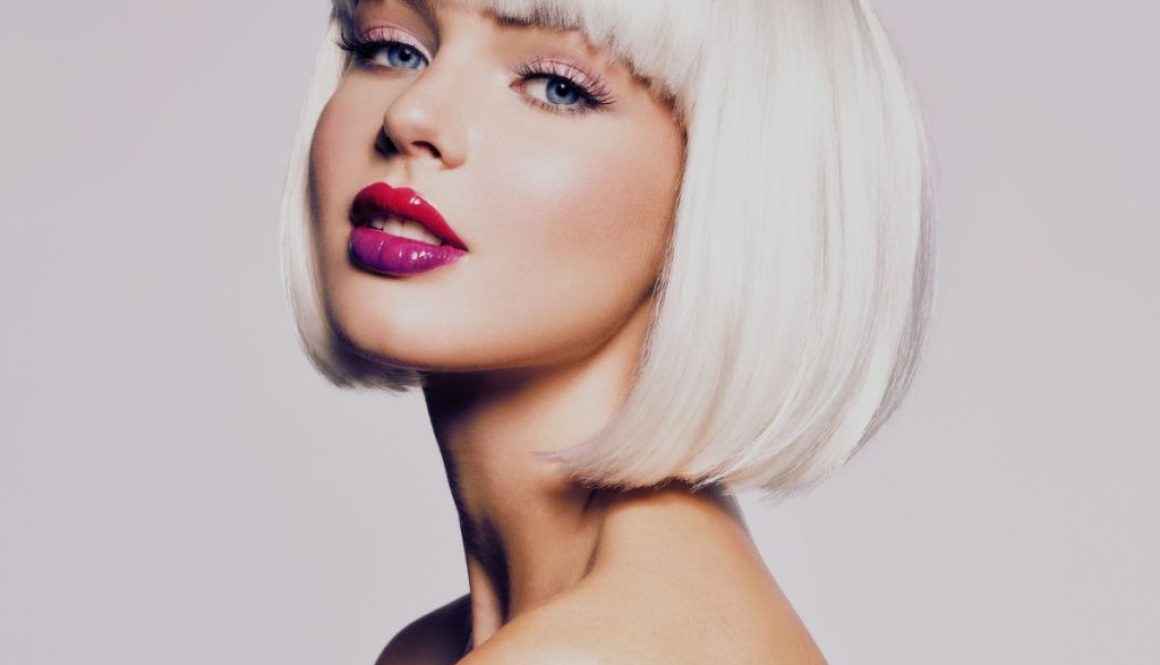 The woman has an Italian bob hairstyle.
